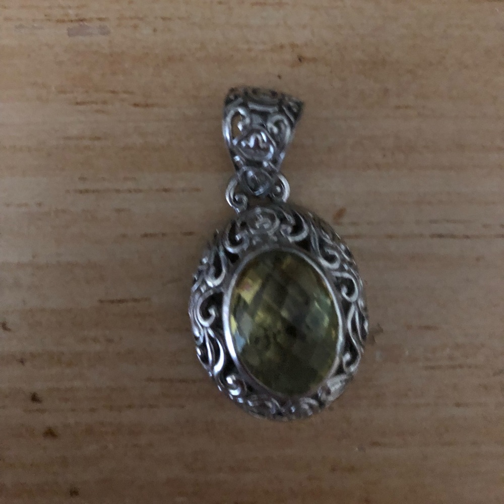 Filigree style pendant.
